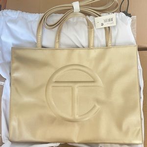 Telfar large gold shopping bag